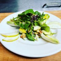 Endive salad · Served with mesclun greens, pears, blue cheese, toasted walnuts and honey Dijon dressing 