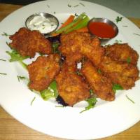 8 Zing Wings  · Zing wings are spicy 
8 Super Bowl Zing wings served with celery and carrots.
Choice of sauc...