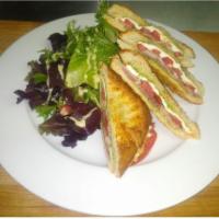 Croque Monsieur · Hot sandwich with ham, Gruyere cheese and bachamel, served with home fries or mix greens sal...