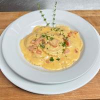 Lobster Ravioli  · Served with Pink creamy sauce 