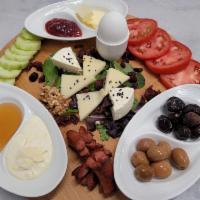 Breakfast Plate  · Feta cheese, mozzarella cheese, tomato, cucumber, green olives, black olives, honey, cream, ...