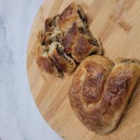 Kol Borek  · Handmade phyllo dough stuffed with feta cheese, spinach with feta byor ground beef.
