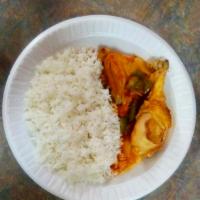 Chicken Stew  · Slowly cooked chicken in a tomato sauce, served with choice of rice
