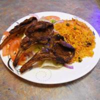 Grilled Lamb Chops (5pcs) · Served with Pita bread & your choice of any 2 side orders