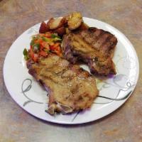 Grilled Pork Chops (2pcs) · Served with pita bread & any 2 side orders