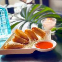 Burmese Gold Samosas (Vegan)... · Crispy triangles filled with delicious stuffing made of potatoes, carrots and peas. Sizzled ...