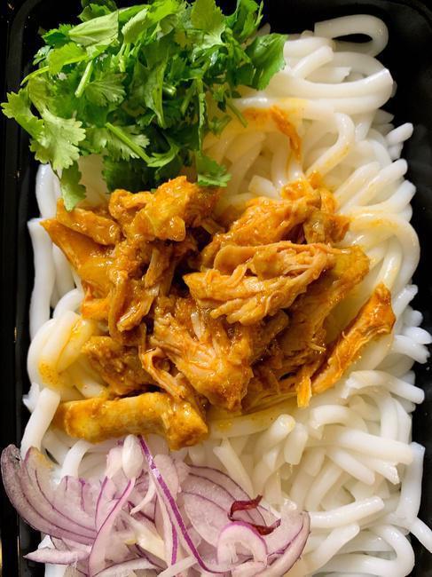 Chicken Noodle Salad. · Rice noodles  with pulled chicken curry sauce, eggs,  fried garlic, zested with tamarind (GF, DF, NF).