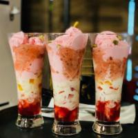 Strawberry Falooda. · Popular iconic dessert from Yangon. Premium strawberry ice cream, assorted fruit jelly, milk...