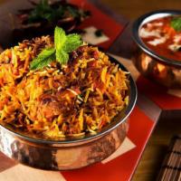Hyderabadi Chicken Dum Biryani · Hyderabadi dum biryani is a style of biryani from Hyderabad, India made with basmati rice an...