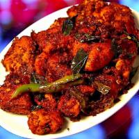 Hyderabadi Chicken Curry · Chicken cooked in traditional Hyderabadi style with homemade spices.