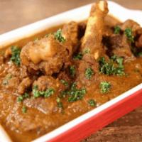 Goat Chettinad · Goat made with roasted ground exotic spices peppercorn, star anise and coconut.