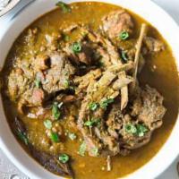 House Special Goat Curry · Goat cooked in traditional Andhra style with homemade spices.