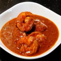 Shrimp Vindaloo · Shrimp cooked in rich spicy tangy gravy with potatoes, coconut and curry leaves.