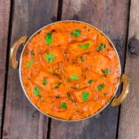 Paneer Makhani · Vegetarian delight cottage cheese cooked in cream and tomato gravy.