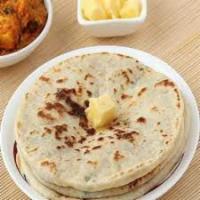 Tandoori Butter Roti · Whole wheat flour cooked with butter in clay oven.