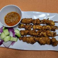 A3. Chicken Satay  · 4 Skewers. Marinated chicken with Malaysia spices grilled to perfection.
