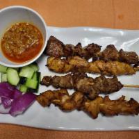 A5. Chicken & Beef Satay  · 4 Skewers. Marinated chicken and beef with Malaysia spices grilled to perfection served with...