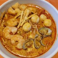  Curry Noodle Soup (Seafood) · Seafood. Yellow noodle, dried tofu with mixed seafood curry soup.