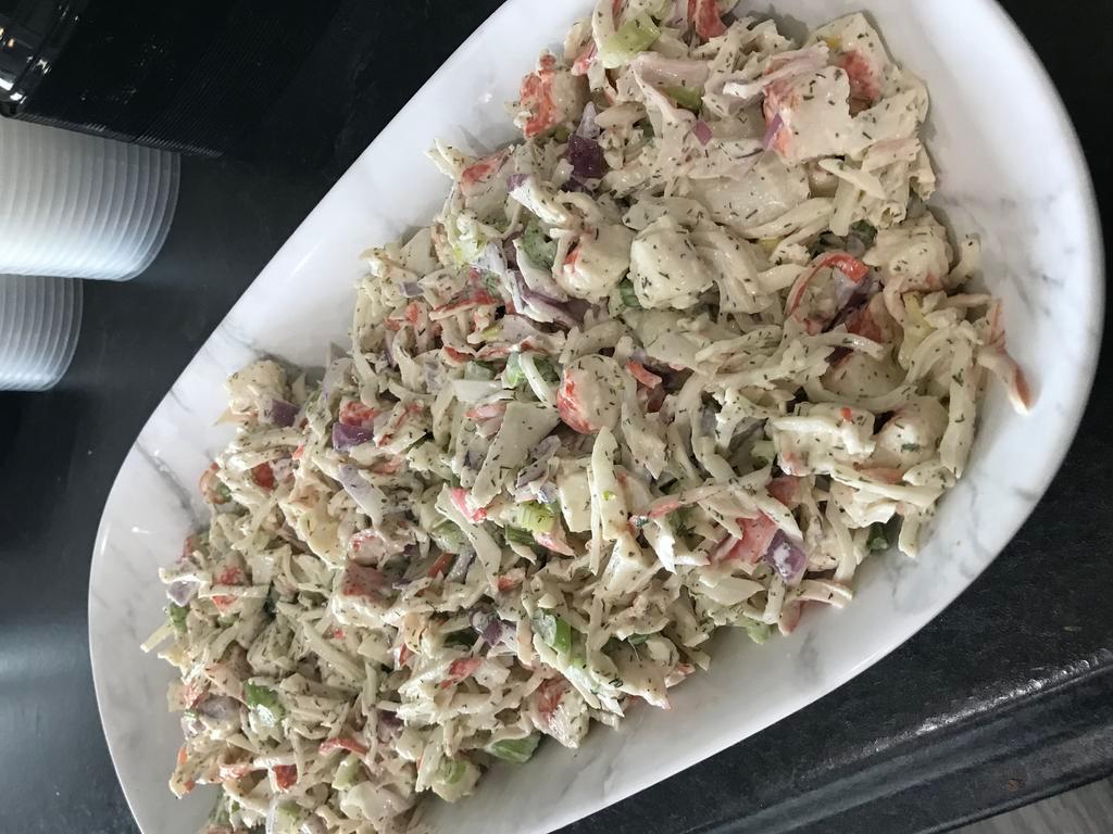  Crab Salad  · Mixture of imitation crab flakes, mayonnaise, onions.
