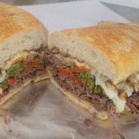 4. Peter Special · Seasoned shaved steak, mozzarella, caramelized onions, bell peppers and mayonnaise.