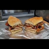 8. Mario Special · Chicken cutlet, eggplant mozzarella, roasted red peppers, balsamic and olive oil.