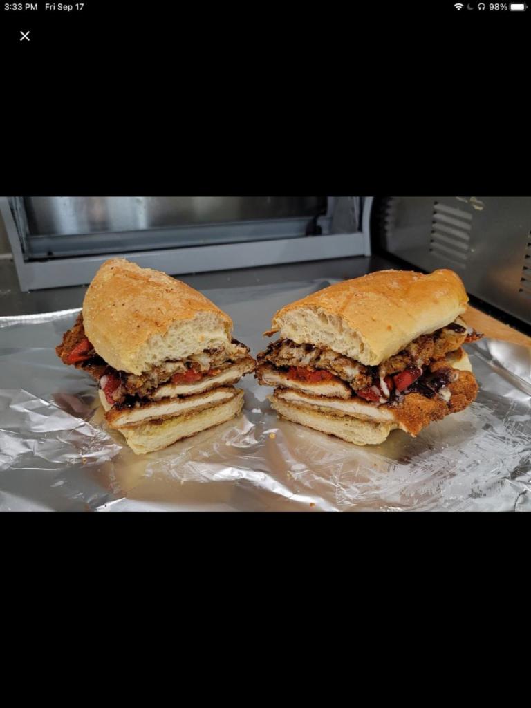 8. Mario Special · Chicken cutlet, eggplant mozzarella, roasted red peppers, balsamic and olive oil.