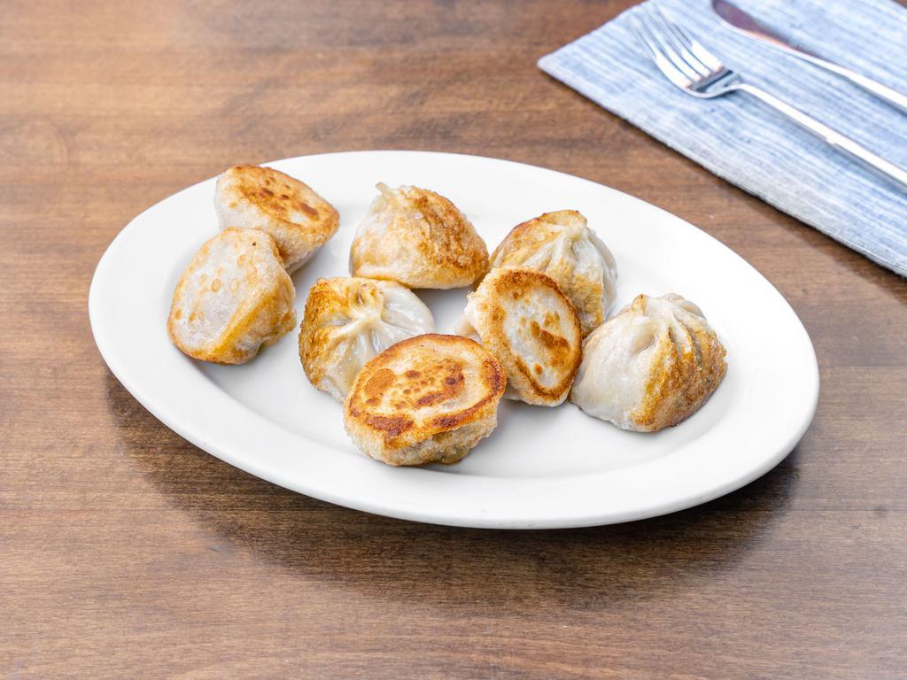 Fried Chive and Beef Momo Dumpling · 8 pieces. Steamed dumpling with chive and beef mix filling which is pan fried after steaming.