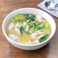 Dumpling in Soup · Choice of meat dumpling in soup with bok choy, black mushroom, and glass noodle.