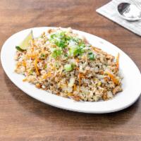 Fried Rice · Cooked rice that has been stir fried with choice of meat, carrots, and cabbage.