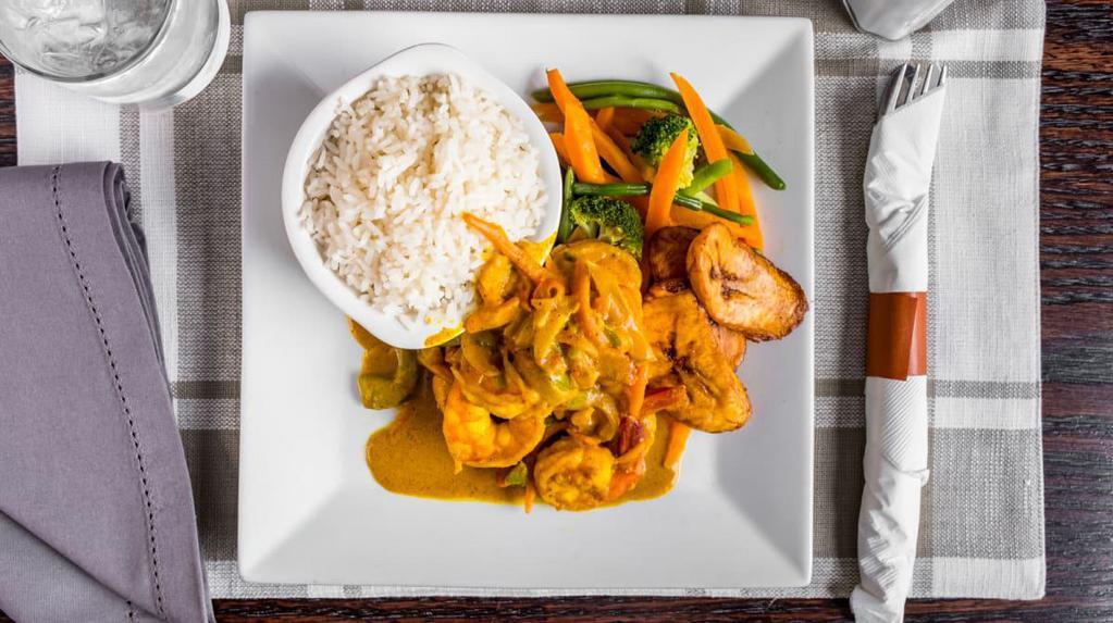 Shrimp Lovers · Served with stirfry veggies, rice, and plantains.