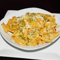Irie Pasta · Breezes Irie Pasta is a  dish made with bell peppers, onion, creamy sauce and Caribbean seas...