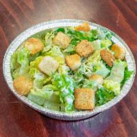 Caesar Salad ·  Green salad with Caesar dressing and cheese. 
