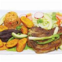 26. T-Bone Steak · Served with rice, beans, avocado, sweet plantains and salad.