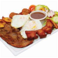 Bandeja Paisa · Grilled beef, pork crackling, egg, rice, beans, sweet plantains, sausage and salad. Served w...
