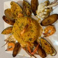 41. Paella · Seafood mixed with rice.