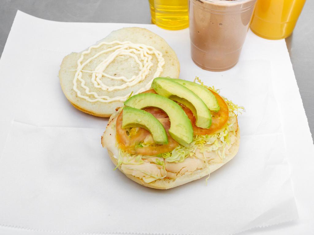 The Mami House Sandwich · Avocado, Swiss cheese, chipotle, chicken, tomatoes, lettuce and mayo.