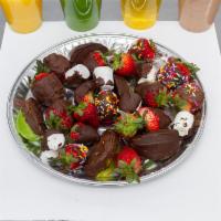 Strawberry, apple and marshmallows with chocolate  · A mix fruits with chocolate covered  to sweeten your life