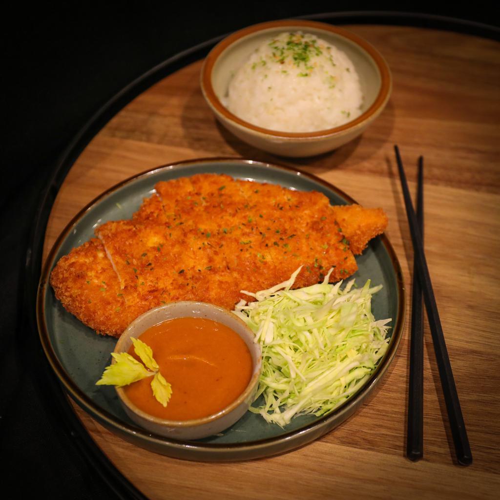 Chicken Katsu · Chicken, served with rice, salad, house made tangy katsu sauce.
