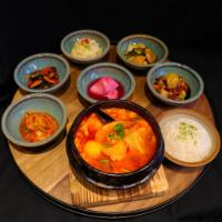 Tofu Soup · soft tofu, zucchini, onion, scallion, served with rice and side dish, your choice of beef or...