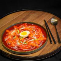 Rose Creamy Tteokbokki · Rice cake, fish cake, green onion, boiled egg in cream and spicy sauce.