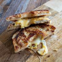Inverted Grilled Cheese Sandwich · Inverted bagel, Muenster cheese, American cheese, and griddled to perfection.