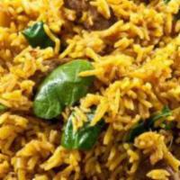 Lamb Biryani · A unique layered  royal style biryani succulent lamb pieces slowly cooked with special India...