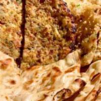 Bread Basket · 1 naan, 1 garlic naan, 1 roti, and 1 onion kulcha