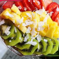 Dragon · Pitaya base topped with granola, pineapple, strawberry, kiwi, coconut flakes, honey