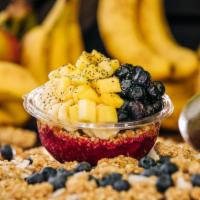 Maui · Pitaya base topped with granola, banana, blueberry, mango, chia seeds, honey