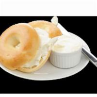 Bagel and Cream Cheese · Boiled and baked round bread roll. Soft mild cheese. 