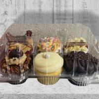 6 Pack Assortment · An assortment of 6 cupcakes in your choice of flavors