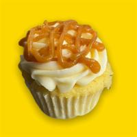 Salted Caramel Cheesecake Cupcake · Fresh made Vanilla Bean cake made with Madagascar vanilla beans topped with our homemade che...