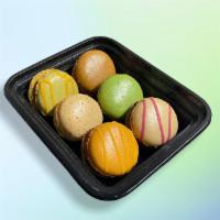 6 Pack Assortment of Macarons · A random assortment  of our delicious French Macarons. Flavors may  include Tiramisu, Mango ...
