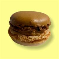 Tiramisu Macaron · Espresso  and cocoa flavored macaron shell filled with a fancy mascarpone cream spiked with ...